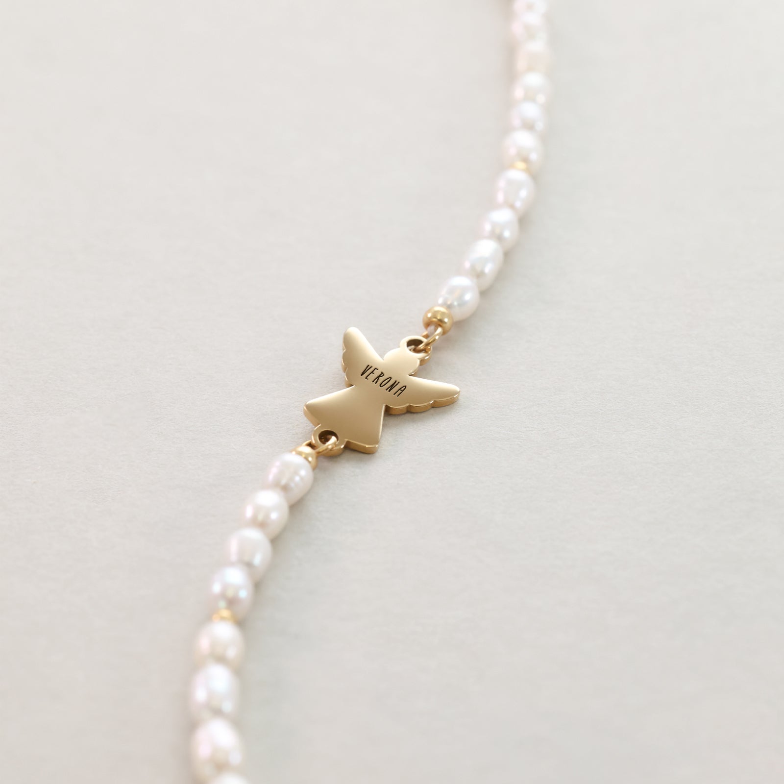 Personalized protective bracelet with guardian angel & freshwater pearls