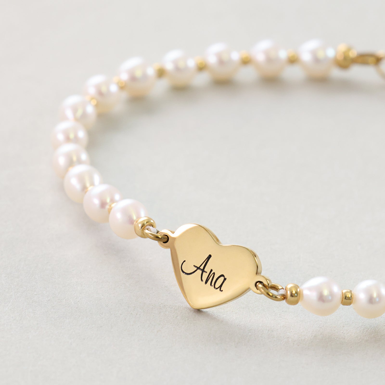 Süßwasser-Perlenarmband mit Herzchen