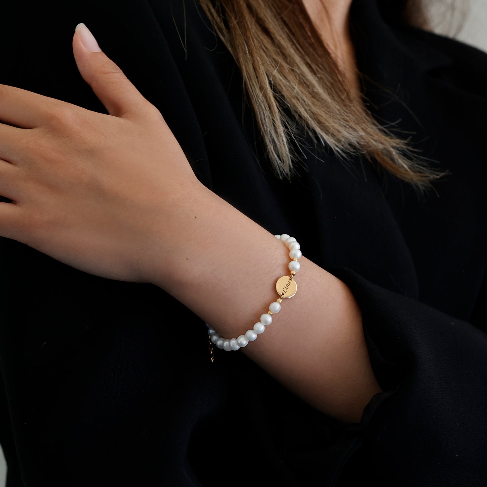 Süßwasserperlen Armband mit runden Plättchen