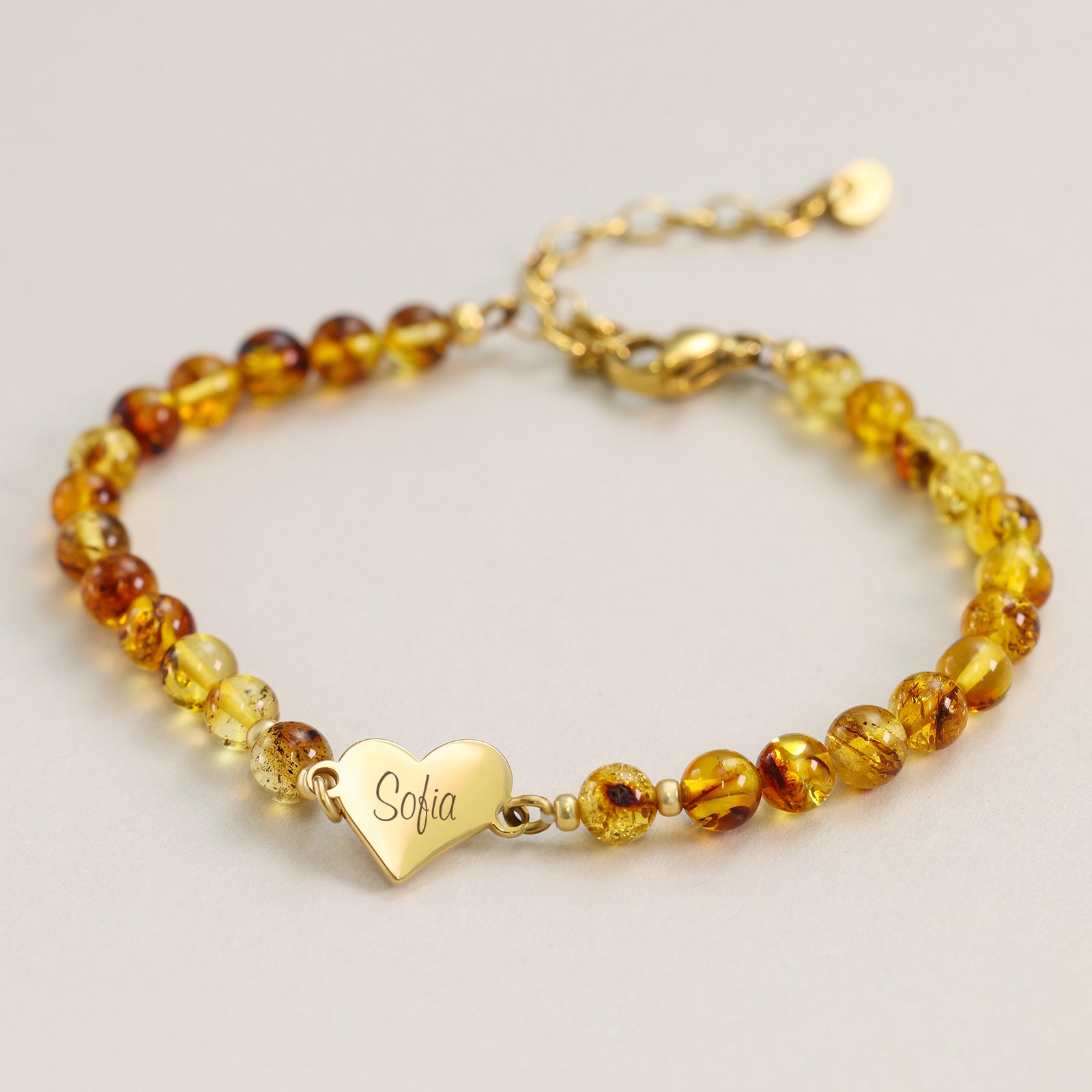 Bernstein Armband mit Herzplättchen