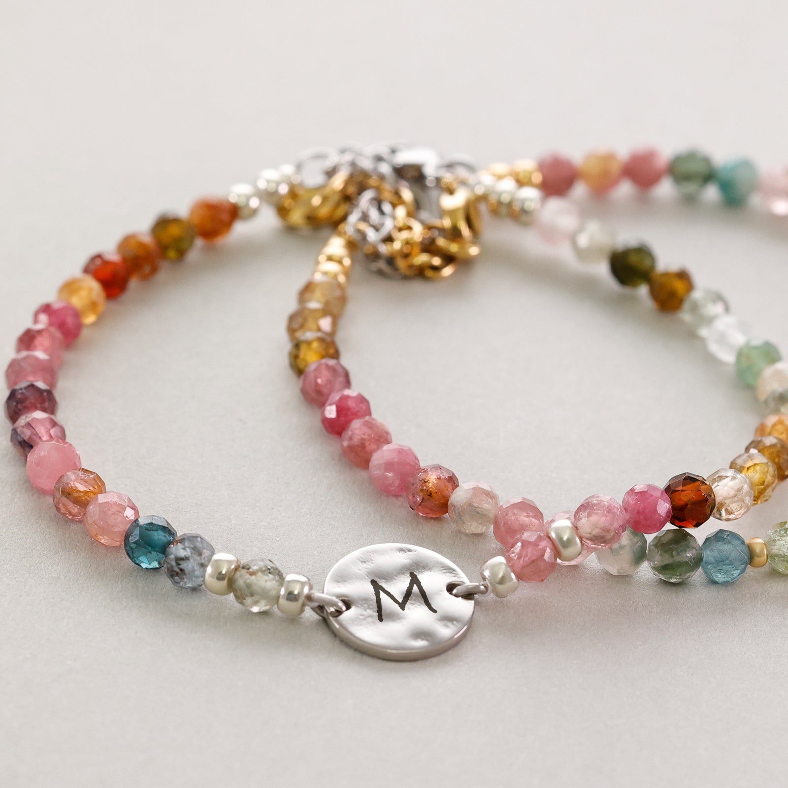 Rainbow tourmaline bracelet with hammered plate