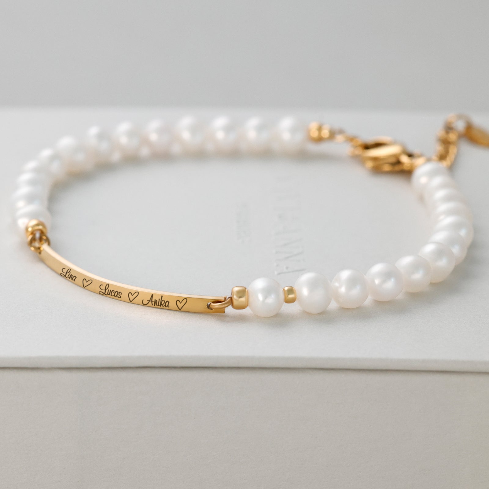 Süßwasserperlen Armband mit Namensplatte