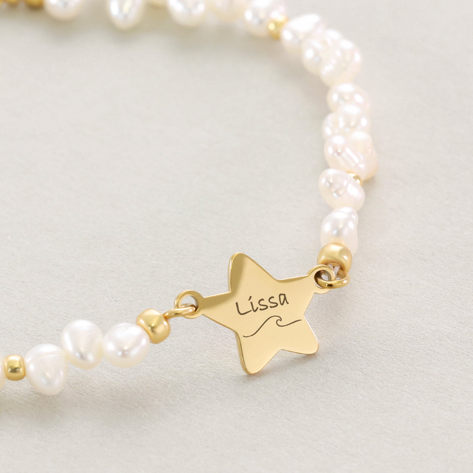 Süßwasserperlen Armband mit Sternanhänger