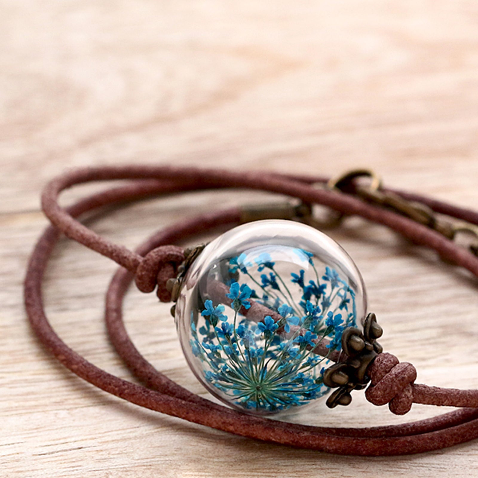 Leather necklace made of real turquoise dill flowers