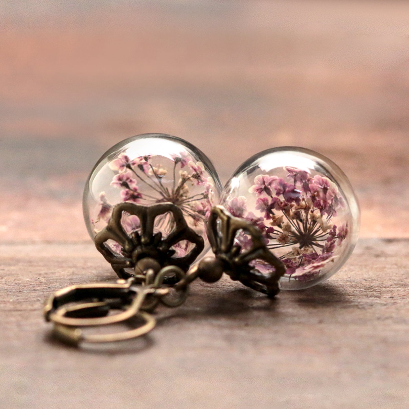 Earrings with real purple dill flowers