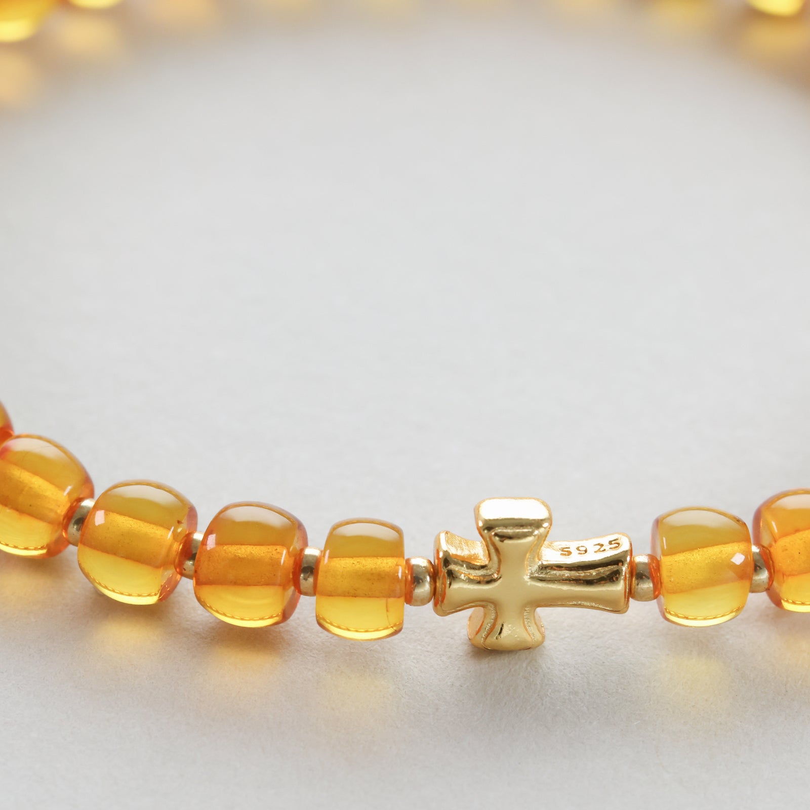 Amber bracelet with engravable heart pendant