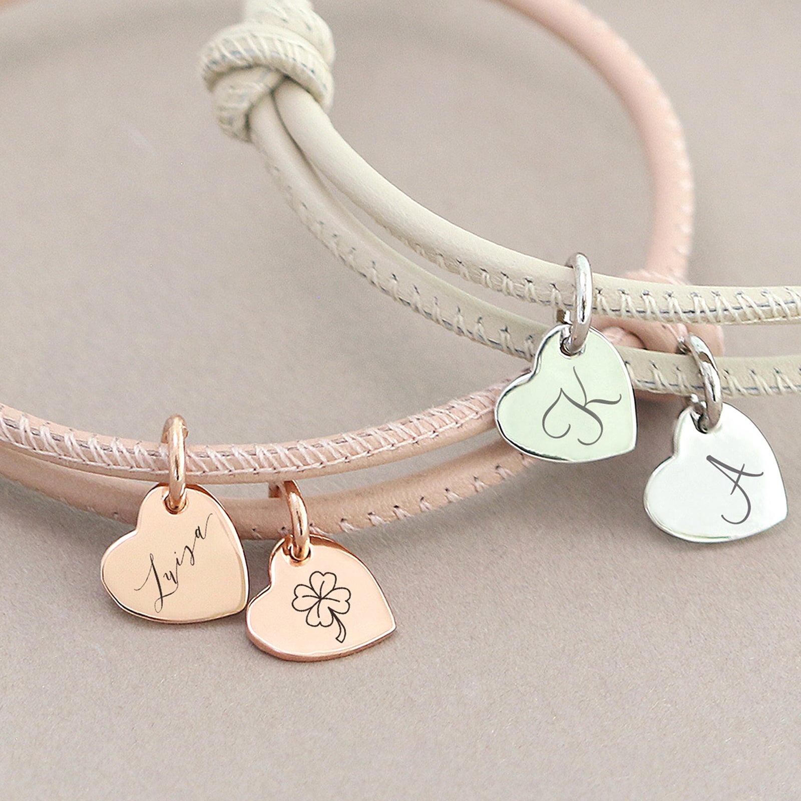 Adjustable leather bracelet with heart pendant
