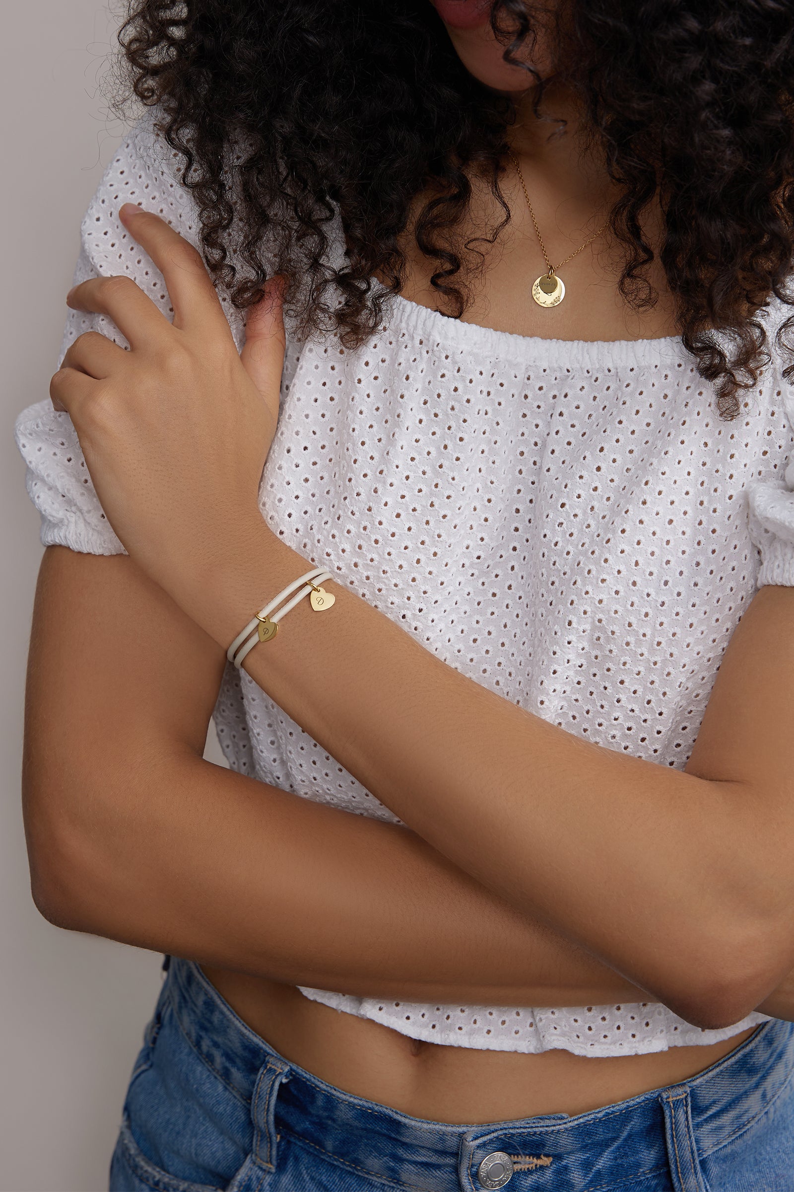 Adjustable leather bracelet with heart pendant